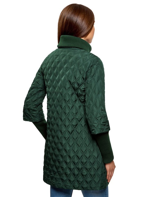 Green quilted coat: back view