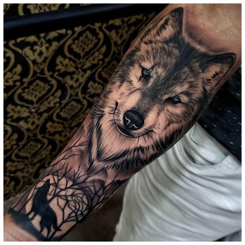 Wolf tattoo sa kamay ng isang tao