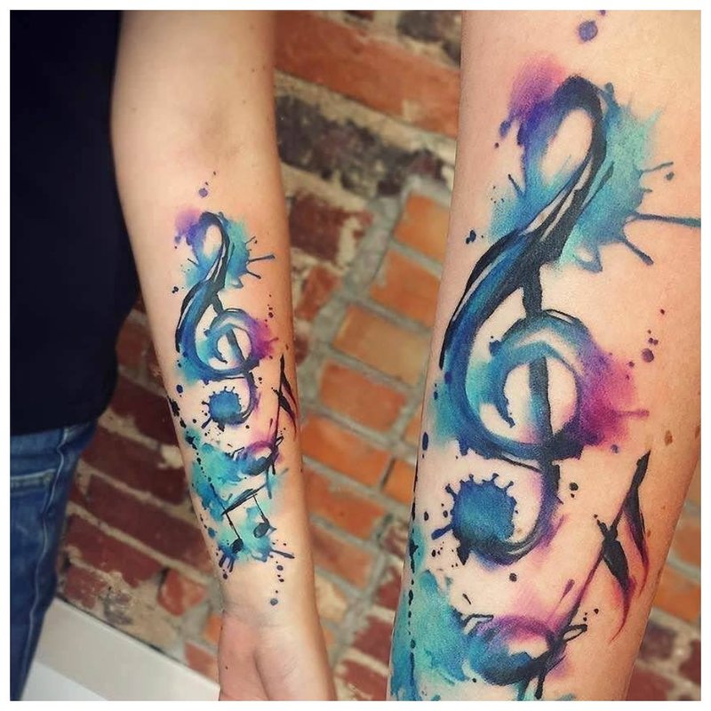 Treble clef watercolor tattoo