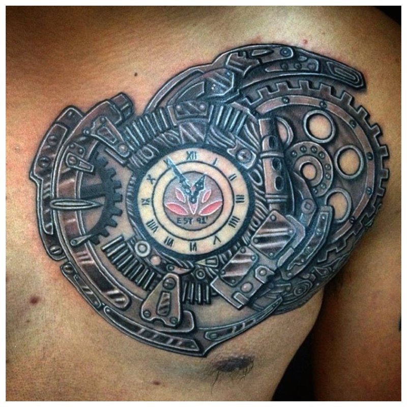 Steampunk tattoo na may isang orasan