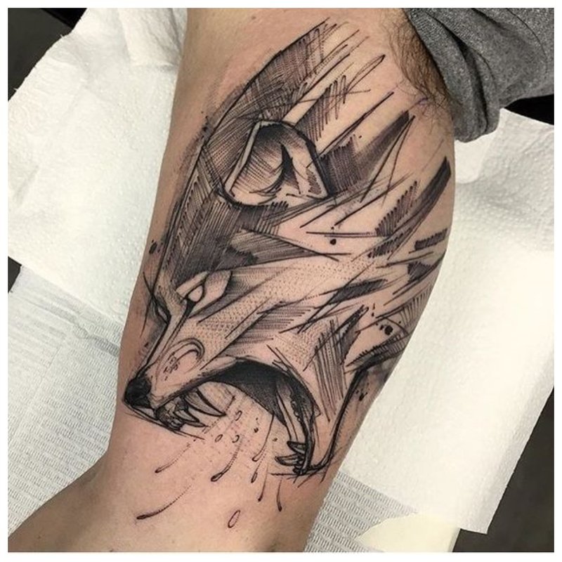 Ang bibig ni Wolf - isang tattoo sa katawan ng isang tao